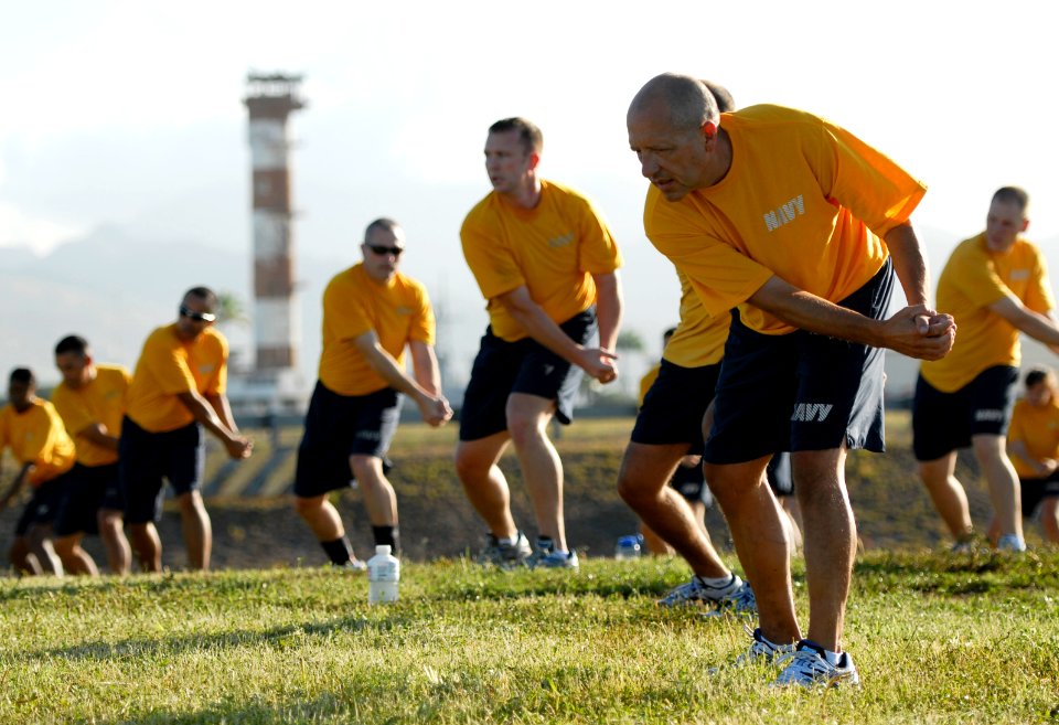 US Navy 101117-N-7498L-297 Sailors assigned to Afloat Training Group, Middle Pacific, attend a special fitness training session with Gilad Janklowi