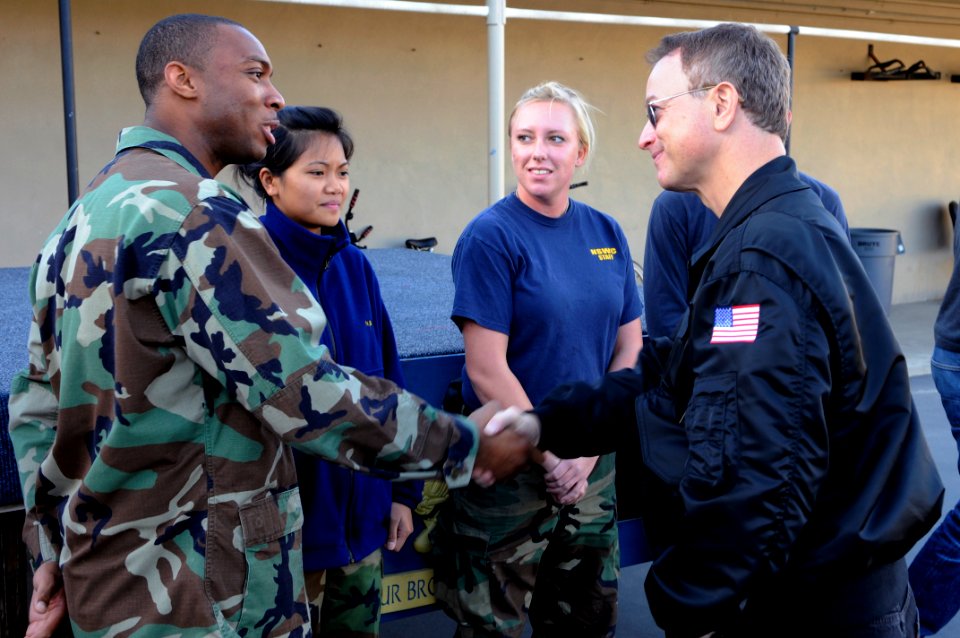 US Navy 101122-N-7883G-038 Actor Gary Sinise speaks with Sailors at the armory at Naval Special Warfare Center. Sinise spent the day touring vario