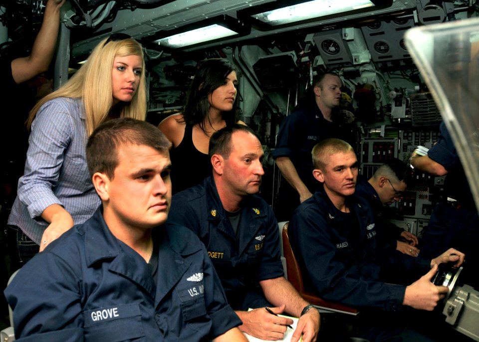 US Navy 101119-N-3560G-002 Friends and family of the attack submarine USS Cheyenne (SSN 773) crew observe submarine control operations during a dep