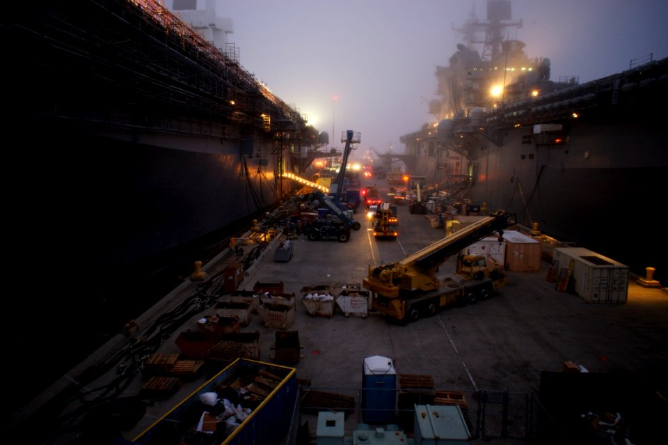US Navy 101118-N-9643K-794 A view of the amphibious assault ships USS Bonhomme Richard (LHD 6) and USS Makin Island (LHD 8) in early morning fog