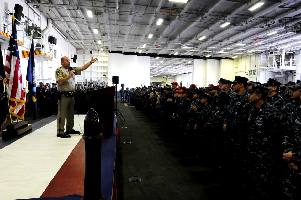 US Navy 101119-N-0232G-020 California highway patrol officer Mark Gregg addresses Sailors aboard the aircraft carrier USS Ronald Reagan (CVN 76) du