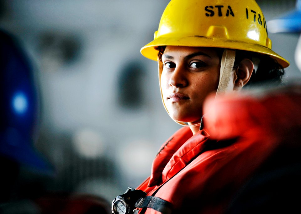 US Navy 101118-N-6003P-150 Boatswain's Mate Seaman Samantha Zamora stands by to receive cargo and supplies during a replenishment
