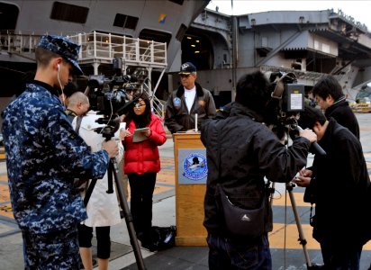 US Navy 101124-N-7103C-015 Capt. David A. Lausman, commanding officer of the aircraft carrier USS George Washington (CVN 73), conducts a news confe