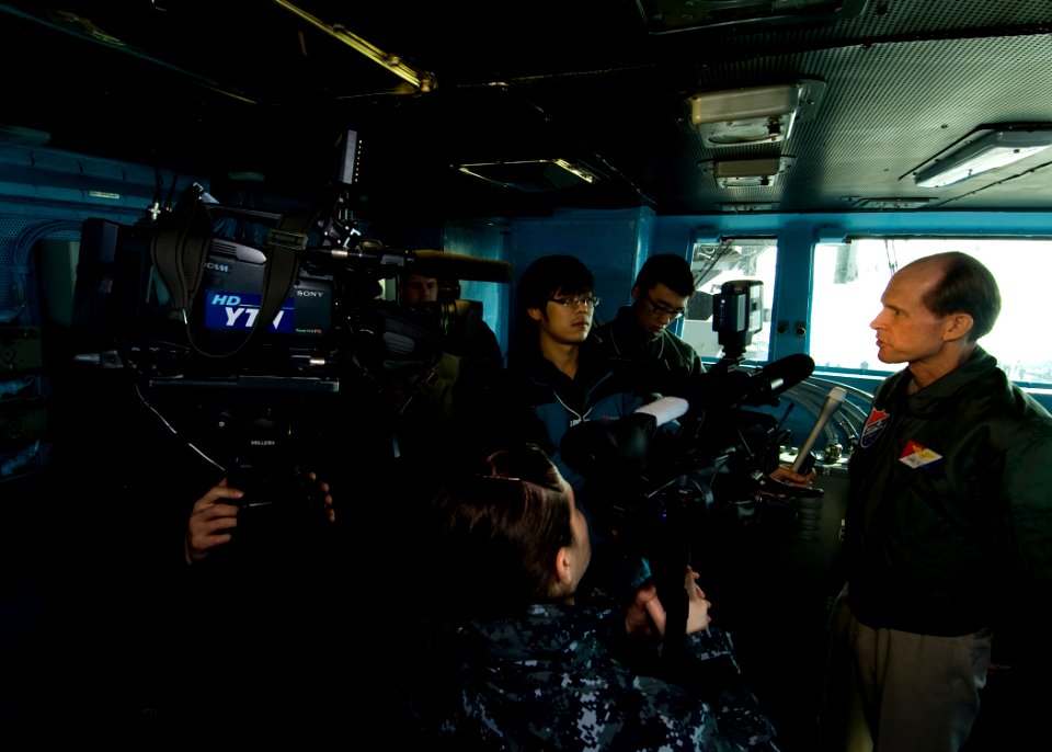 US Navy 101129-N-9626Y-053 Embarked members of the Republic of Korea media interview Rear Adm. Dan Cloyd, commander of Combined Task Force (CTF) 70