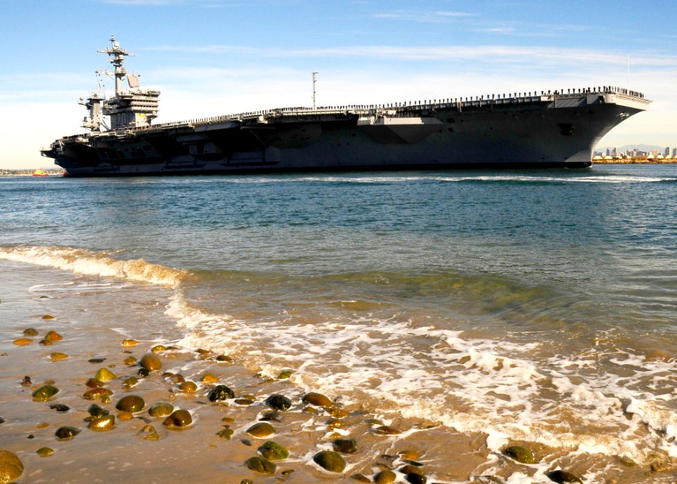 US Navy 101130-N-5694F-086 The aircraft carrier USS Carl Vinson (CVN 70) departs San Diego Harbor