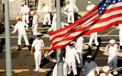 US Navy 101130-N-7498L-085 Sailors handle lines and prepare the guided-missile destroyer USS Paul Hamilton (DDG 60) for departure from Joint Base P