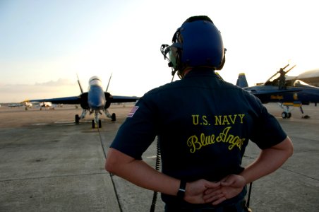 US Navy 101122-N-0092J-025 Before the Blue Angels perform at an air show site, the team's narrator and events coordinator fly to each proposed show