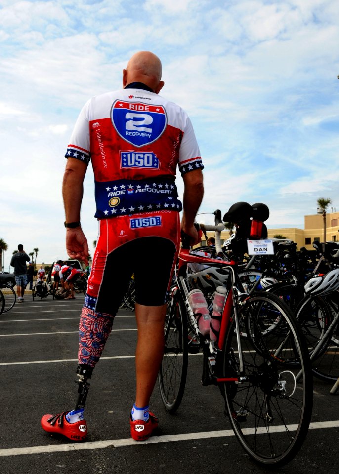 US Navy 101120-N-5812W-003 Dan O'Connor waits his turn to put his bike away after completing the 350-mile Ride 2 Recovery Challenge. O'Connor was o