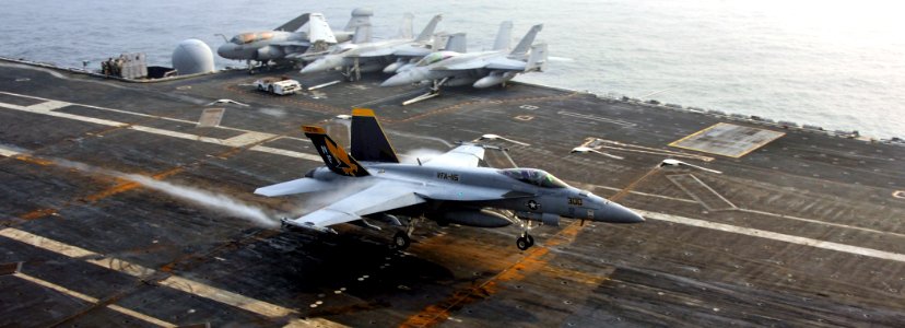 US Navy 101130-N-7103C-084 An F-A-18E Super Hornet assigned to the Eagles of Strike Fighter Squadron (VFA) 115 lands aboard the aircraft carrier US