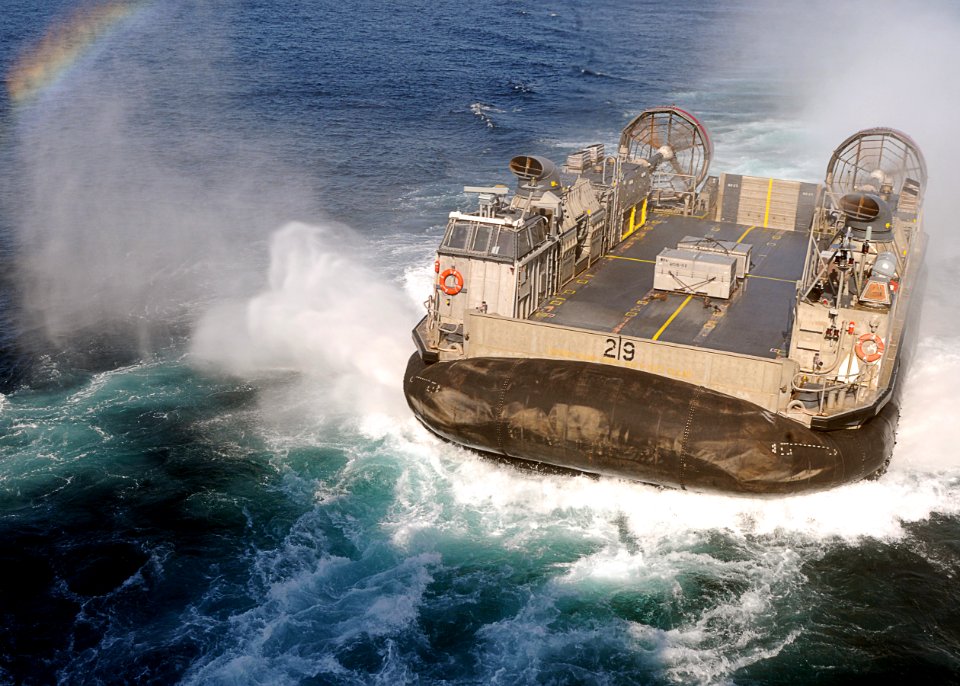 US Navy 101201-N-4743B-086 A landing craft air cushion approaches the well deck of the forward-deployed amphibious assault ship USS Essex (LHD 2)