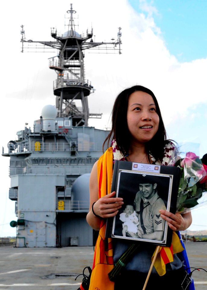 US Navy 101129-N-8539M-004 Grace Tarawa Tran, who was born aboard the Ex-USS Tarawa (LHA 1) after her family had been rescued at sea in 1979, revis