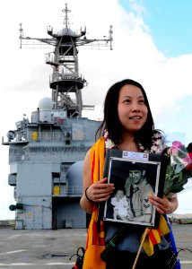 US Navy 101129-N-8539M-004 Grace Tarawa Tran, who was born aboard the Ex-USS Tarawa (LHA 1) after her family had been rescued at sea in 1979, revis