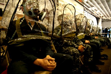 US Navy 101129-N-6552M-175 Sailors aboard the amphibious assault ship USS Boxer (LHD 4) participate in a joint service mask leak test