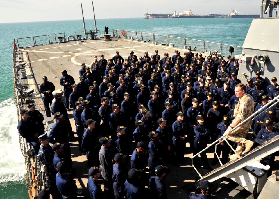 US Navy 101126-N-6499D-256 Royal Navy Vice Adm. Tony Radakin speaks to Sailors assigned to USS O'Kane (DDG 77) during an all-hands call