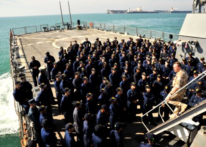 US Navy 101126-N-6499D-256 Royal Navy Vice Adm. Tony Radakin speaks to Sailors assigned to USS O'Kane (DDG 77) during an all-hands call