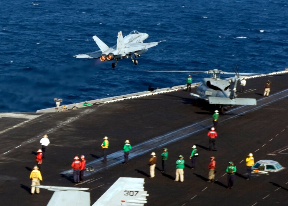 US Navy 101126-N-6427M-283 An F-A-18C Hornet assigned to the Checkerboards of Marine Fighter Attack Squadron (VMFA) 312, launches from the aircraf
