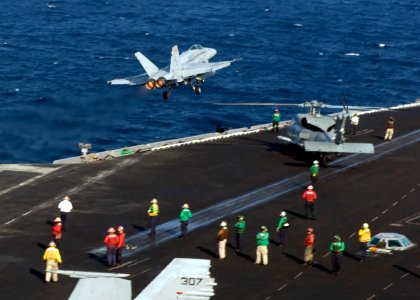 US Navy 101126-N-6427M-283 An F-A-18C Hornet assigned to the Checkerboards of Marine Fighter Attack Squadron (VMFA) 312, launches from the aircraf
