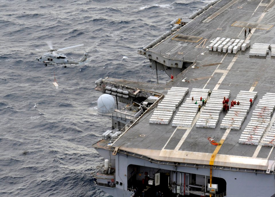 US Navy 101202-N-2013O-266 An MH-60S Sea Hawk helicopter assigned to the Island Knights of Helicopter Combat Support Squadron (HSC) 25 carries ordn