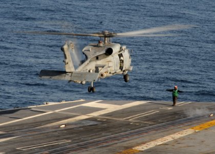 US Navy 101128-N-0754Y-102 An SH-60F Sea Hawk helicopter from the Chargers of Helicopter Anti-Submarine Squadron (HS) 14