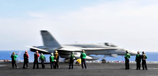 US Navy 101202-N-6003P-115 An F-A-18C Hornet assigned to the Ragin Bulls of Strike Fighter Squadron (VFA) 37 launches from the aircraft carrier USS