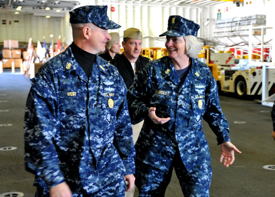 US Navy 101129-N-1281L-010 Master Chief Petty Officer of the Navy Rick West speaks with Command Master Chief Linda Handley during his first visit t