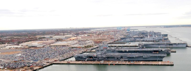 US Navy 101130-N-9589S-125 USS George H. W. Bush (CVN 77) and USS Enterprise (CVN 65) are docked at Naval Station Norfolk photo