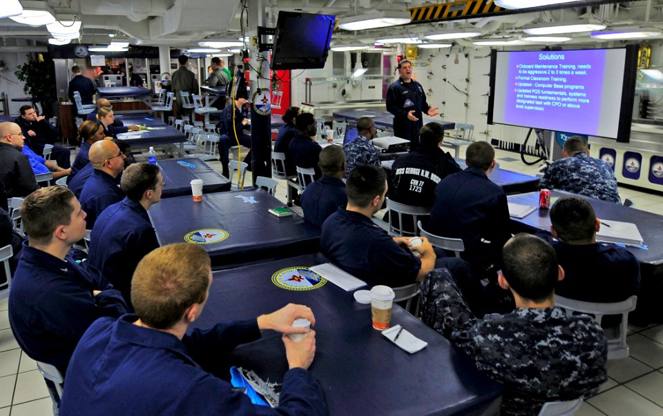 US Navy 101204-N-8913A-060 Master Chief Damage Controlman Lawrence L. Debau, assigned to Commander, Naval Air Forces Atlantic, conducts damage cont