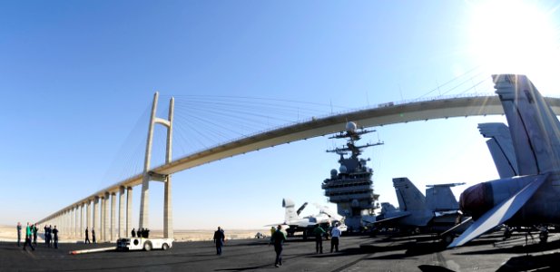 US Navy 101201-N-3793B-621 The aircraft carrier USS Harry S. Truman (CVN 75) passes underneath the Freedom Bridge during a transit of the Suez Cana