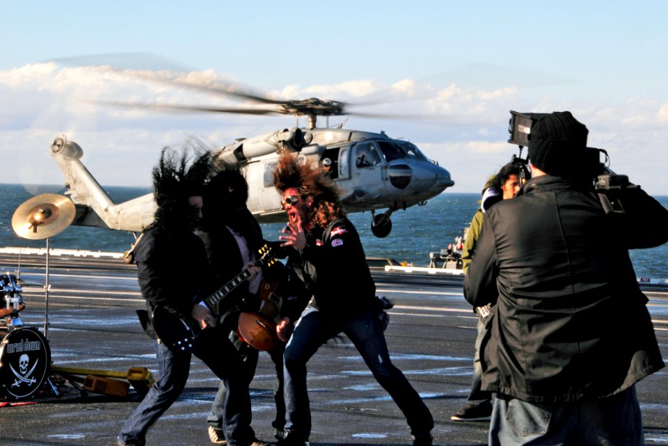 US Navy 101201-N-8913A-115 Members of the North Carolina-based band Airiel Down film a music video on the flight deck of the aircraft carrier USS G