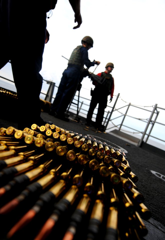 US Navy 101206-N-2055M-130 Boxes of .50-caliber rounds sit on the fantail of the aircraft carrier USS Carl Vinson (CVN 70)