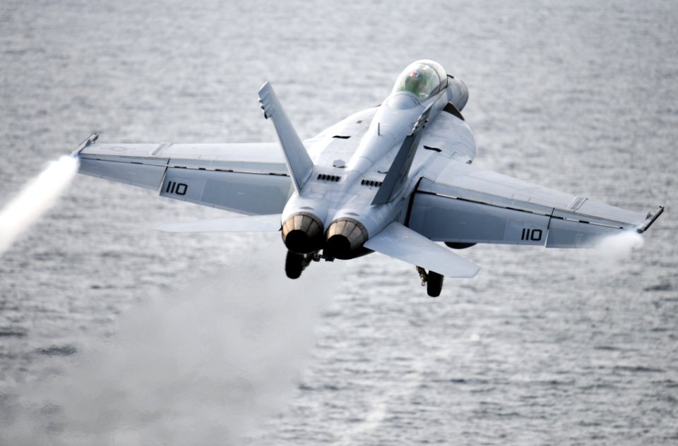 US Navy 101202-N-2055M-383 An F-A-18F Super Hornet assigned to Strike Fighter Squadron (VFA) 22 launches from the aircraft carrier USS Carl Vinson