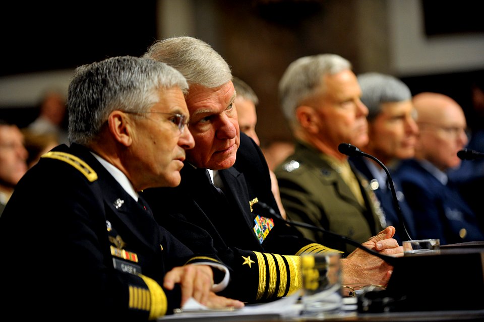 US Navy 101203-N-8273J-137 Chief of Naval Operations (CNO) Adm. Gary Roughead, middle, speaks with Gen. George W. Casey, Chief of Staff of the Army