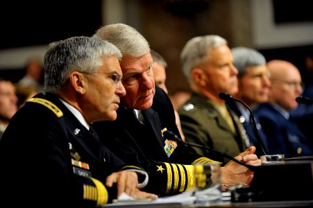 US Navy 101203-N-8273J-137 Chief of Naval Operations (CNO) Adm. Gary Roughead, middle, speaks with Gen. George W. Casey, Chief of Staff of the Army
