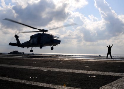 US Navy 101206-N-5538K-234 An SH-60S Sea Hawk helicopter lands aboard the aircraft carrier USS George Washington (CVN 76)