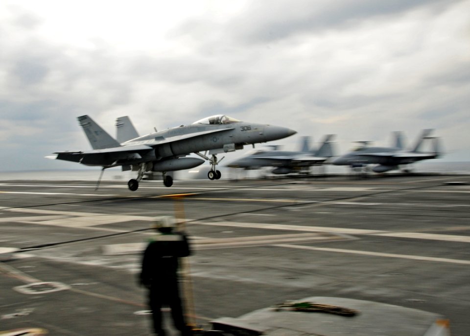 US Navy 101203-N-8913A-109 An F-A-18C Hornet assigned to Strike Fighter Squadron (VFA) 122 lands aboard the aircraft carrier USS George H.W. Bush (