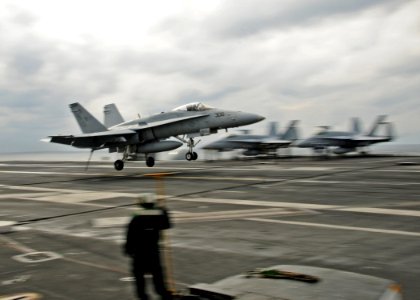 US Navy 101203-N-8913A-109 An F-A-18C Hornet assigned to Strike Fighter Squadron (VFA) 122 lands aboard the aircraft carrier USS George H.W. Bush (