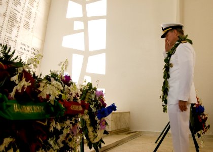 US Navy 101207-N-5476H-258 Adm. Patrick M. Walsh, commander of U.S. Pacific Fleet, renders a salute after presenting a wreath at the USS Arizona Me