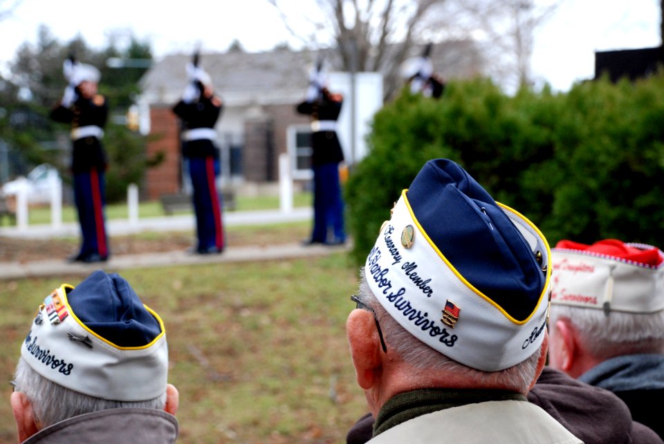 US Navy 101207-N-1251W-002 Survivors of the Dec. 7, 1941 Japanese attack on Pearl Harbor view a 21-gun salute to their fallen comrades during a Pea