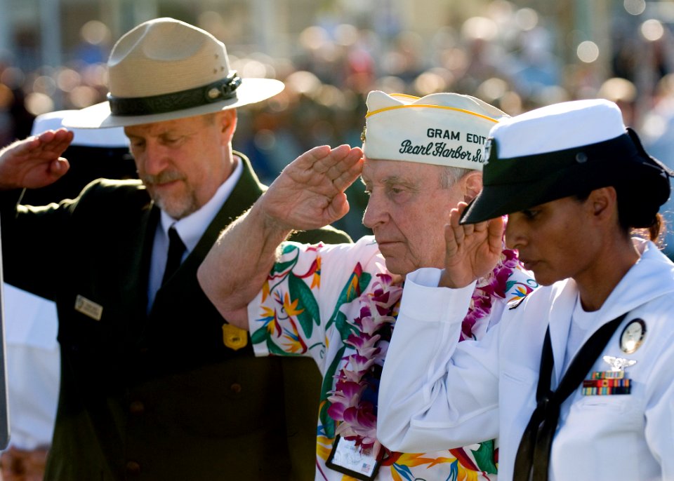 US Navy 101207-N-5476H-162 Wreath presenters render a hand salute after presenting a wreath during a ceremony commemorating the 69th anniversary of