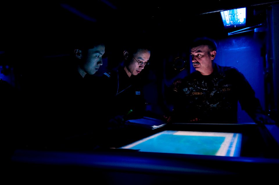 US Navy 101206-N-9626Y-010 Master Chief Fire Controlman David Kirchens practices organizing tactics with Japan Maritime Self-Defense Force sailors