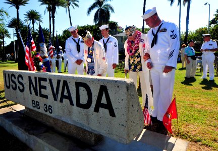 US Navy 101208-N-7948R-337 Sailors assigned to the amphibious dock landing ship USS Pearl Harbor (LSD 52) join Pearl Harbor survivors at a commemor