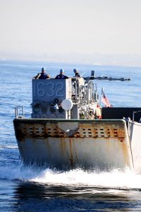 US Navy 101209-N-3659B-089 A landing craft utility approaches the well deck of USS Comstock (LSD 45)