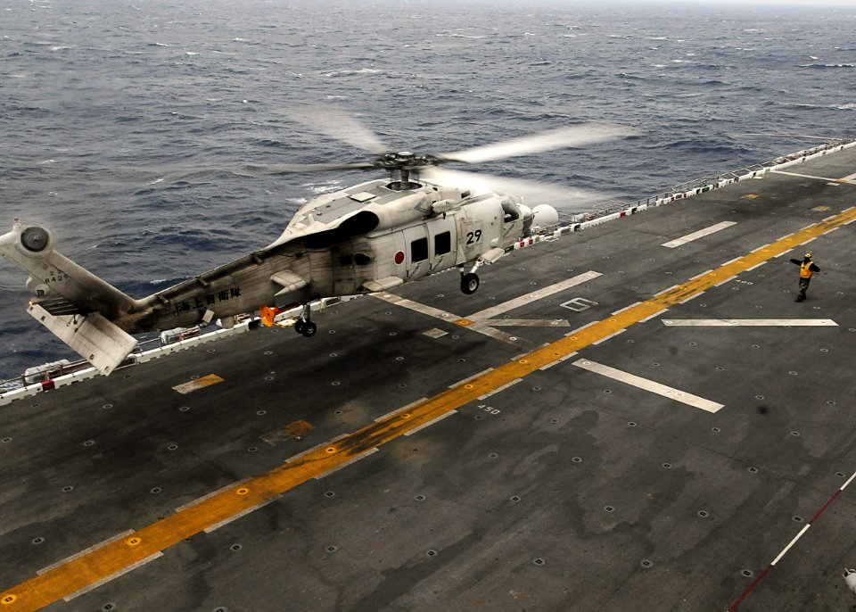 US Navy 101207-N-4743B-146 A Japan Maritime Self-Defense Force SH-60K Sea Hawk helicopter lands aboard the forward-deployed amphibious assault ship