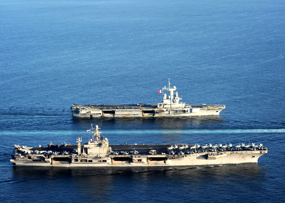 US Navy 101210-N-1261P-035 USS Abraham Lincoln (CVN 72) and Charles De Gaulle (R 91) join together for a United States and France Navy photo opport