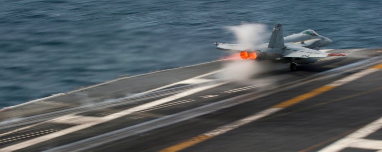 US Navy 101206-N-7981E-093 An F-A-18C Hornet assigned to Strike Fighter Squadron 113 launches from the aircraft carrier USS Carl Vinson (CVN 70)