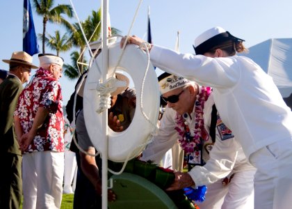 US Navy 101207-N-5476H-178 Woody Derby, a survivor of the Dec. 7, 1941 Japanese attack on Pearl Harbor, and representatives from the U.S. Navy and