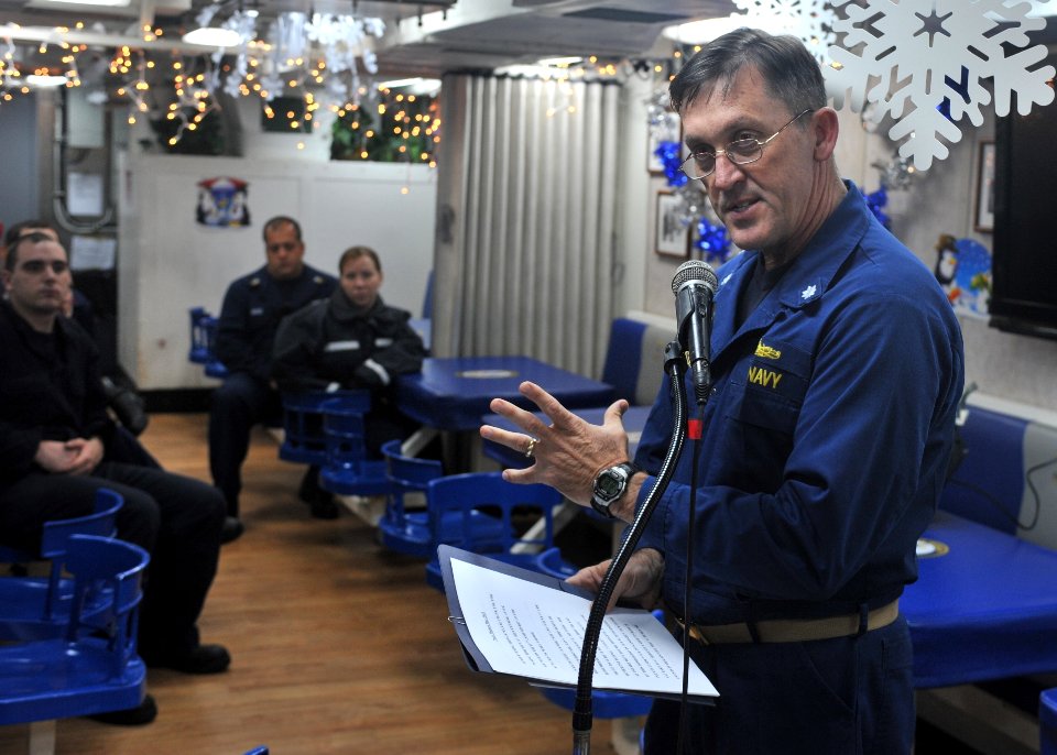 US Navy 101207-N-5838W-003 Cmdr. Kevin M. Robinson addresses the ship's crew on the 69th anniversary of the attack on Pearl Harbor