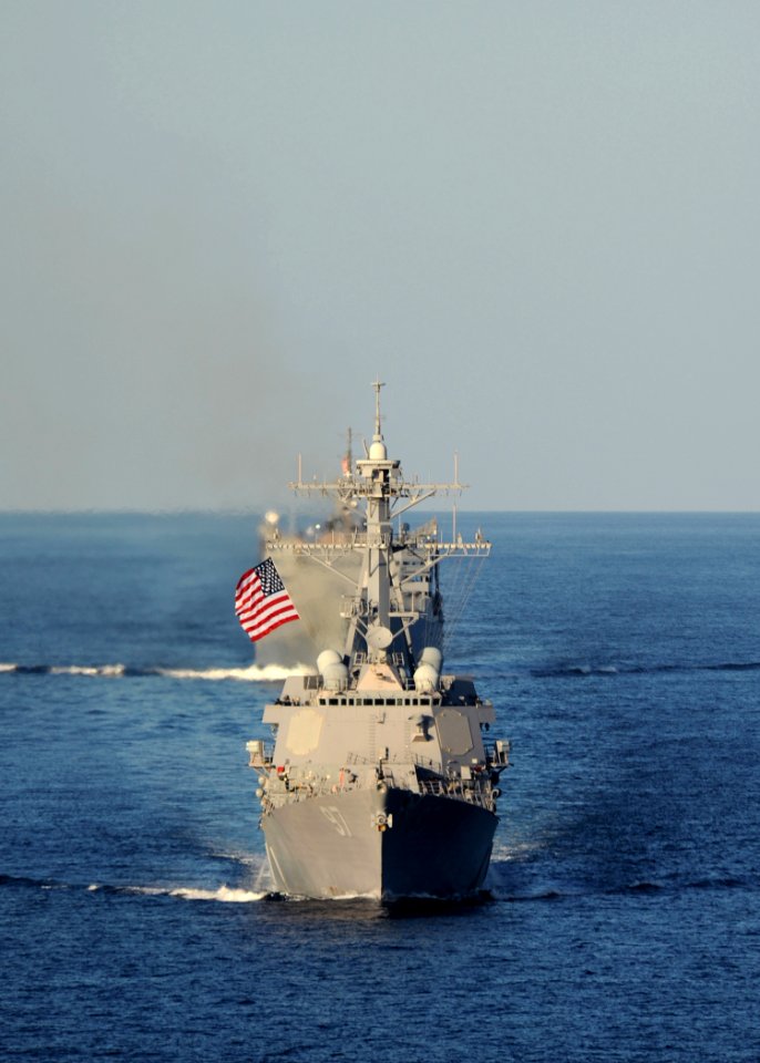 US Navy 101210-N-1261P-021 The guided-missile destroyer USS Halsey (DDG 97) takes lead in formation for the Abraham Lincoln Carrier Strike Group