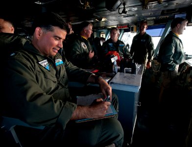 US Navy 101207-N-7981E-622 Cmdr. David Garza evaluates Sailors assigned to Carrier Air Wing (CVW) 17 and the aircraft carrier USS Carl Vinson (CVN