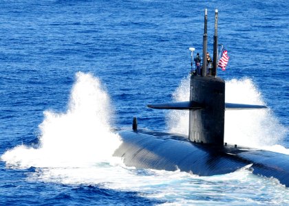 US Navy 101210-N-5538K-050 The Los Angeles-class attack submarine USS Houston (SSN 713) takes part in a photo exercise at the conclusion of exercis